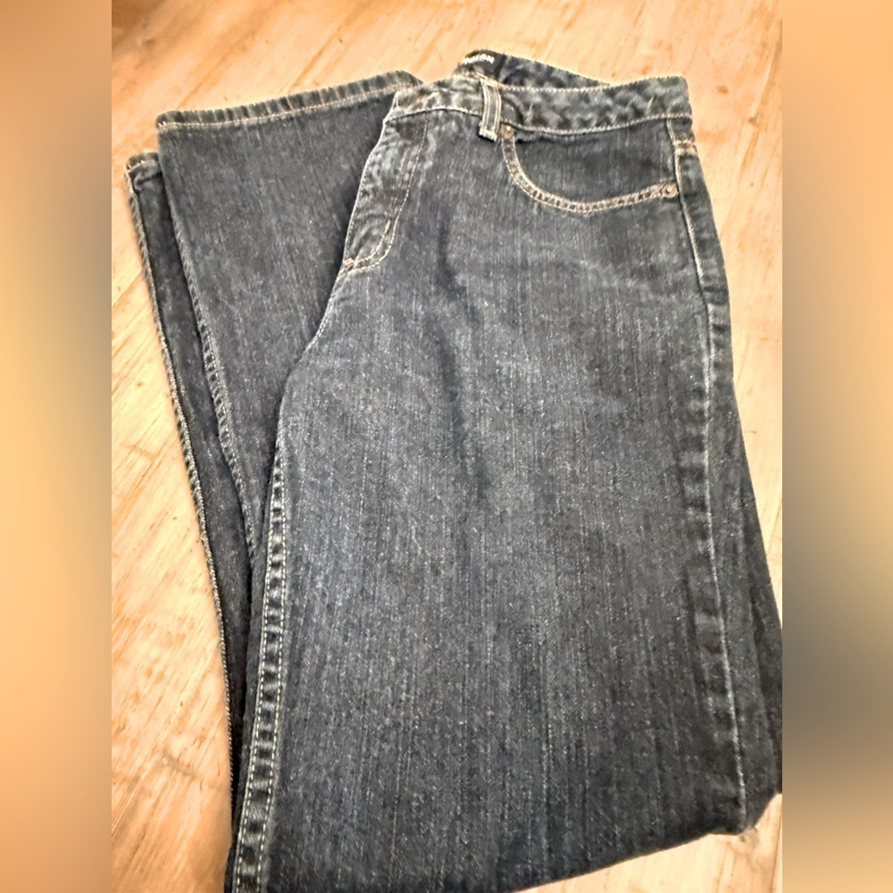 LondonJean woman’s flare leg dark wash jeans. Size 10. Excellent condition.
